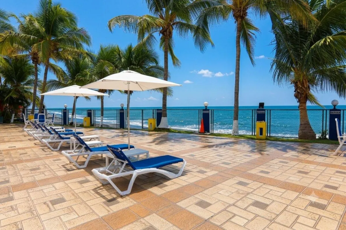 High floor corner unit beach front with sunrise!
