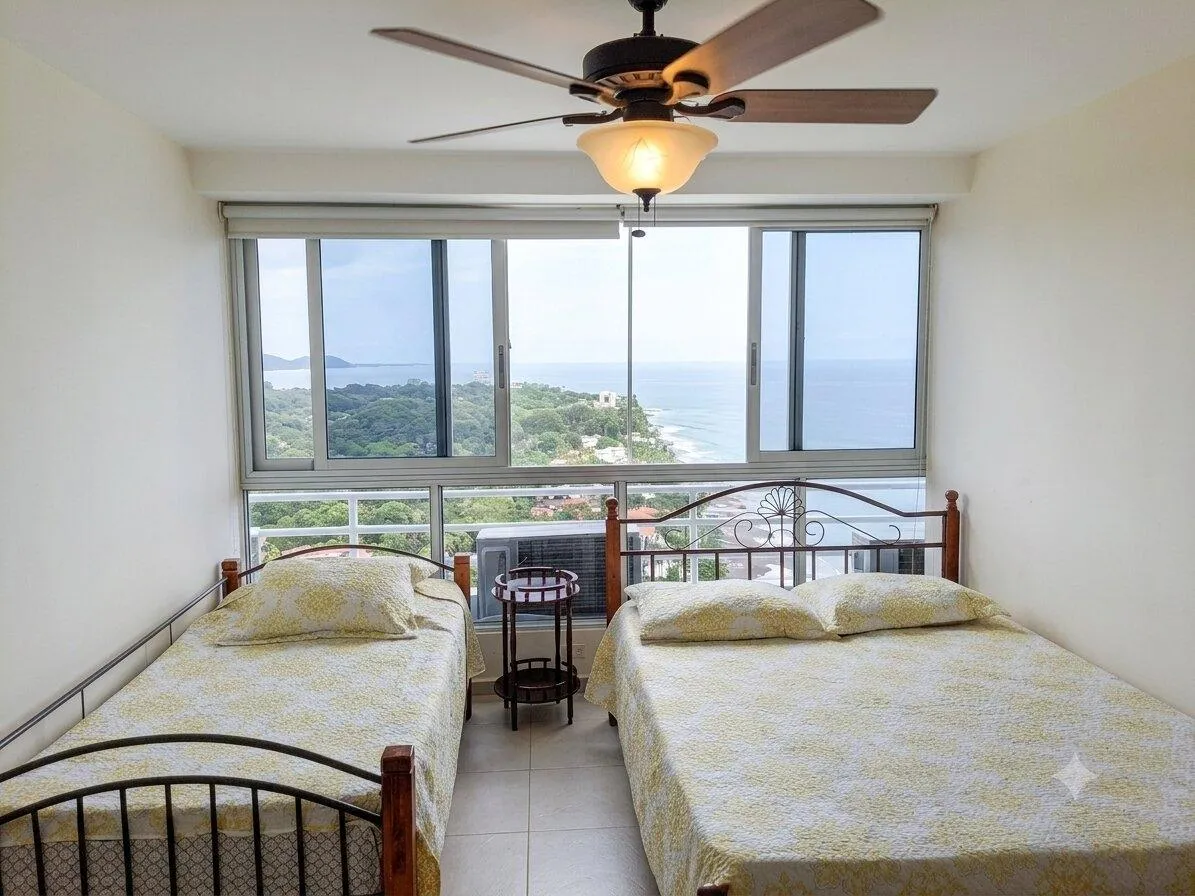 High floor corner unit beach front with sunrise!