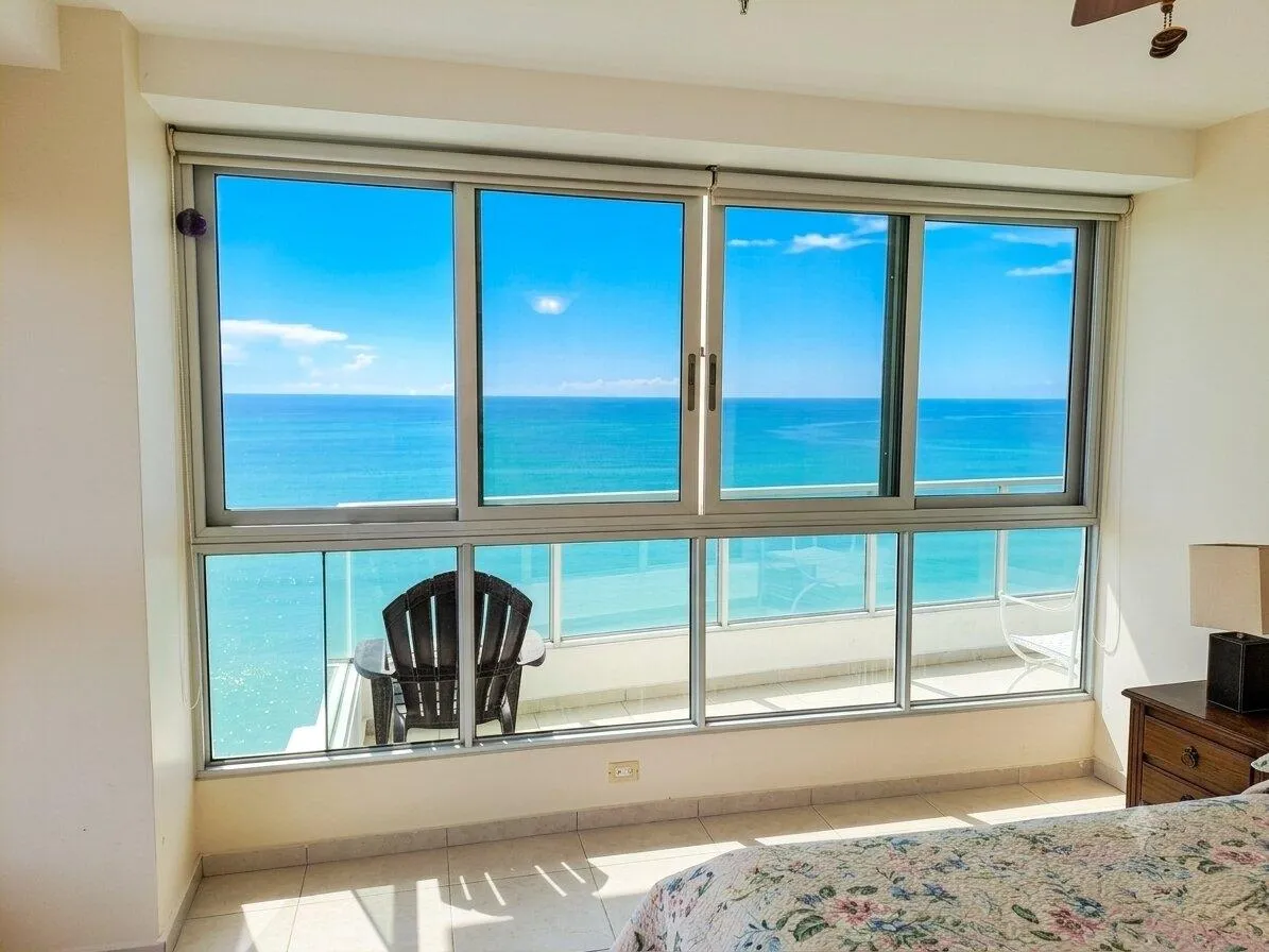 High floor corner unit beach front with sunrise!