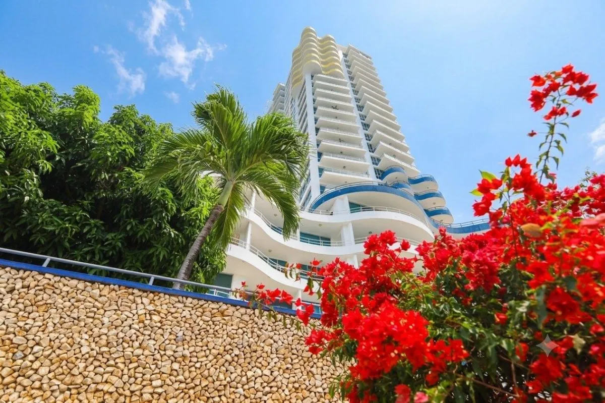 High floor corner unit beach front with sunrise!
