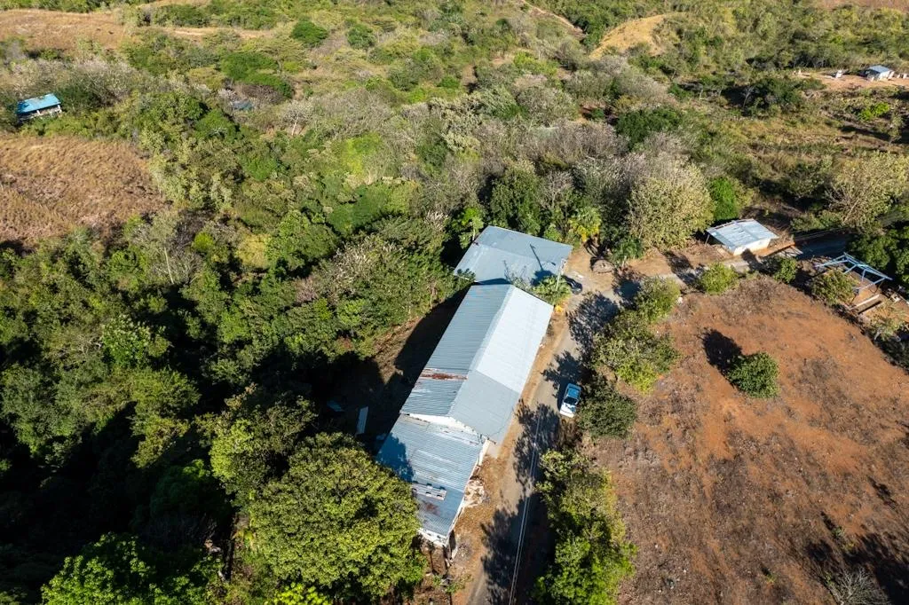 26-hectare land with ocean and mountain views.
