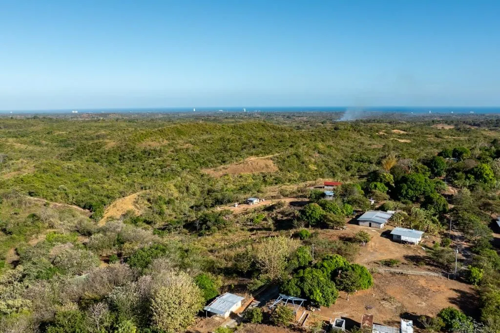 26-hectare land with ocean and mountain views.