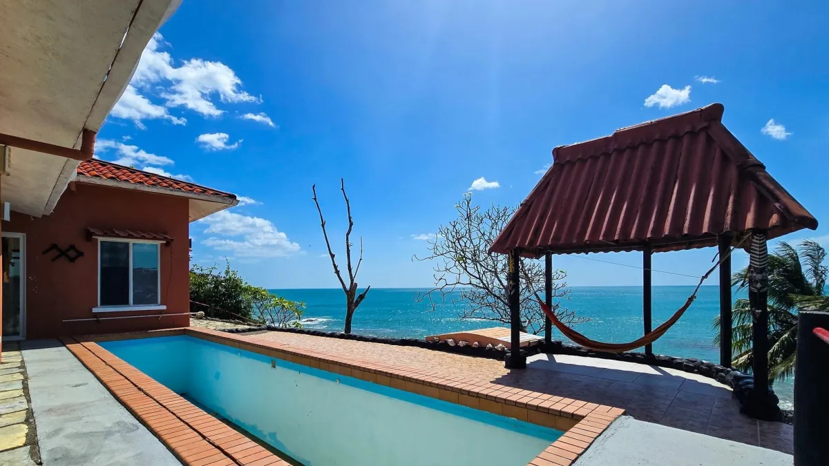 Magnificent Clifftop 3-Sided Oceanfront Home