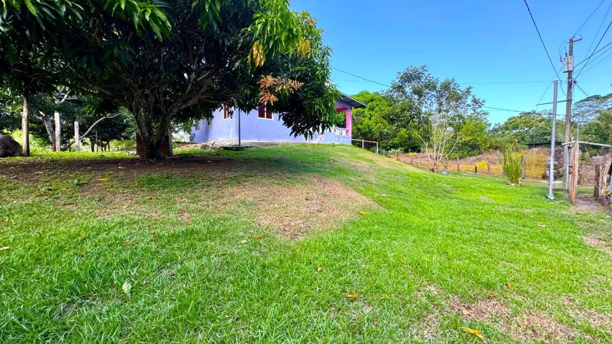 Large plot of land with a small house in Boquerón