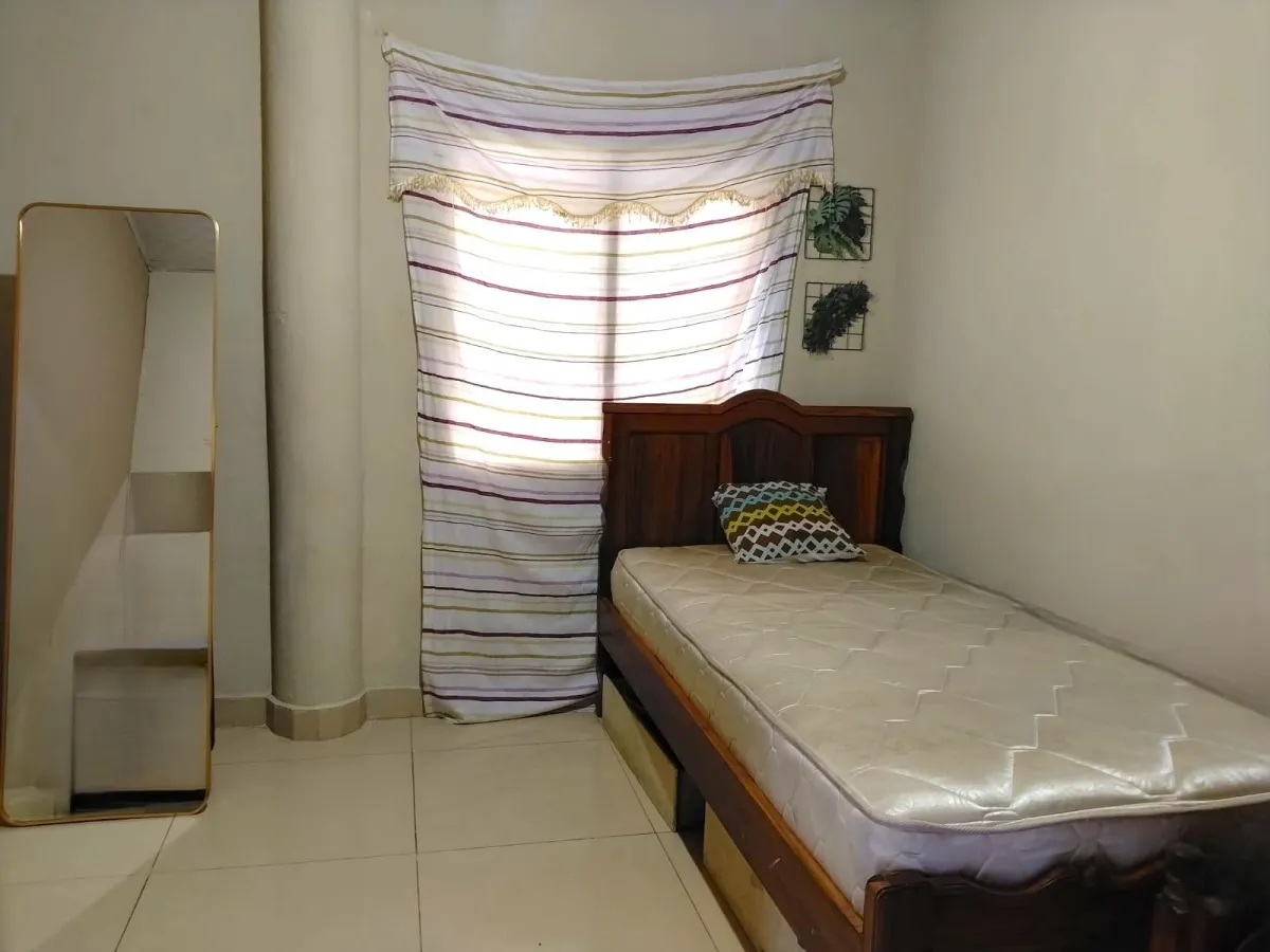 Large plot of land with a small house in Boquerón